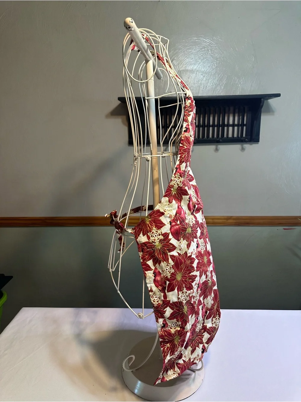 Poinsettia and cardinal apron, napkin, and table runner set